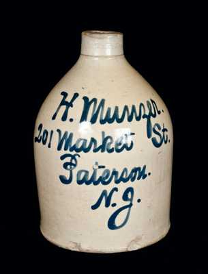 Half-Gallon Paterson, NJ Stoneware Advertising Jug.