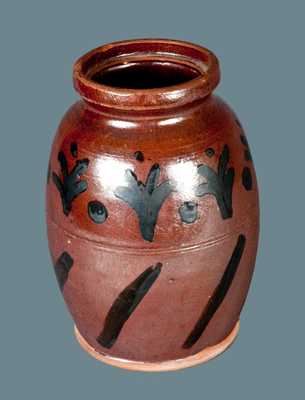 Rare Slip-Decorated Redware Jar, American, early to mid 19th century