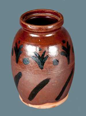 Rare Slip-Decorated Redware Jar, American, early to mid 19th century