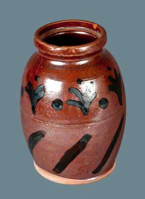 Rare Slip-Decorated Redware Jar, American, early to mid 19th century