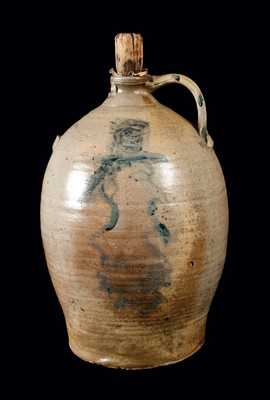 Ohio Stoneware Jug with Man's Head Decoration