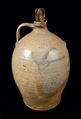 Ohio Stoneware Jug with Man's Head Decoration