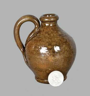 Miniature Ovoid Redware Jug