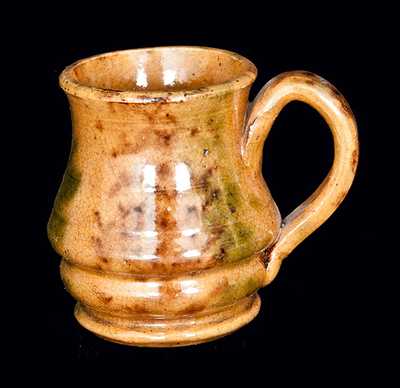 Small Redware Creamer with Multi-Colored Sponged Decoration