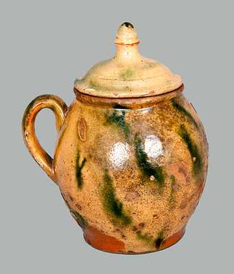 Lidded Redware Jar with Yellow and Green Decoration