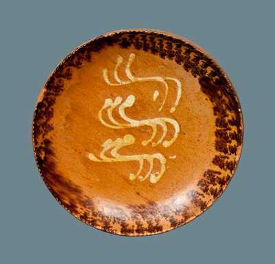 Slip-Decorated Redware Plate with Manganese Sponged Border