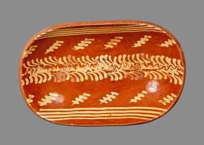 Redware Loaf Dish with Profuse Slip Decoration