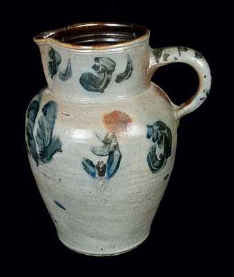 Unusual Floral Decorated Stoneware Pitcher with Striped Handle, probably Midwestern