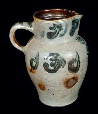 Unusual Floral Decorated Stoneware Pitcher with Striped Handle, probably Midwestern