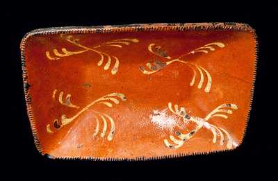 Pennsylvania Slip-Decorated Redware Loaf Dish