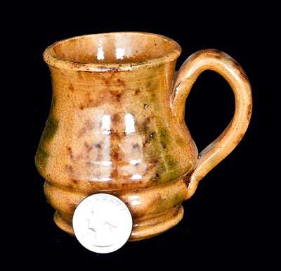 Small Redware Creamer with Multi-Colored Sponged Decoration