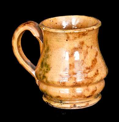 Small Redware Creamer with Multi-Colored Sponged Decoration