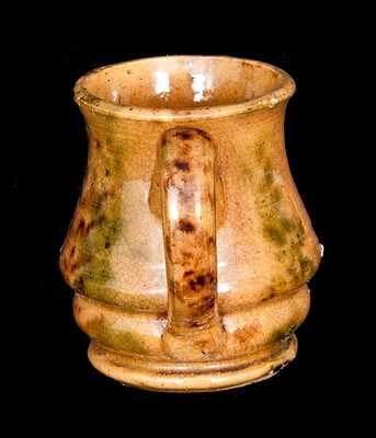 Small Redware Creamer with Multi-Colored Sponged Decoration