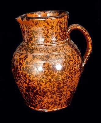 Pennsylvania Redware Pitcher with Speckled Manganese Decoration