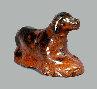 Miniature Molded Redware Toy Reclining Dog with Manganese Highlights