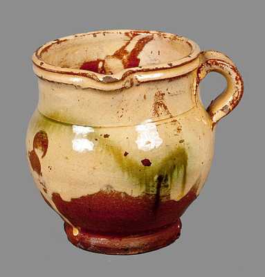 Redware Cream Pitcher with Yellow Lead Slip Coating