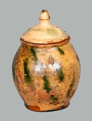 Lidded Redware Jar with Yellow and Green Decoration