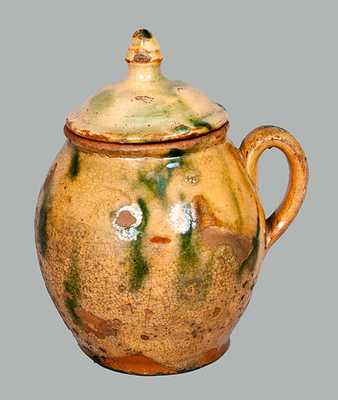 Lidded Redware Jar with Yellow and Green Decoration