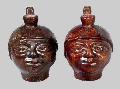 Pair of Redware Face Jugs