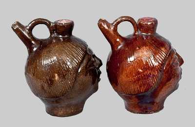 Pair of Redware Face Jugs