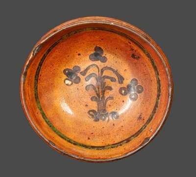 Rare Small Redware Bowl with Slip-Decorated Floral Design, probably Hagerstown, MD area, early 19th century