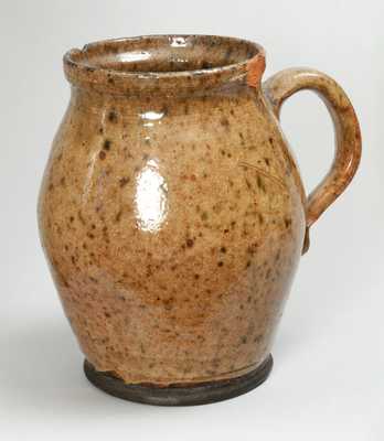 Rare and Fine Green Glazed Redware Handled Jar, New England origin, early 19th century.