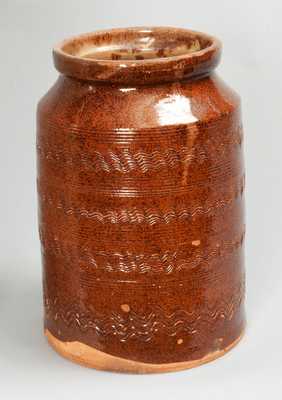 Rare and Fine Glazed Redware Jar with Combed Incising, probably Salem, Massachusetts, late 18th century.