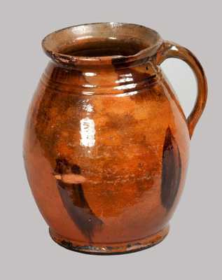 Finely-Glazed Redware Handled Jar, Massachusetts origin, early 19th century.