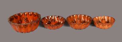 Lot of Four: Redware Cake Molds with Manganese Decoration