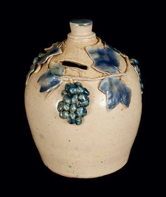 Outstanding Large Stoneware Bank with Applied Grapes and Grape Leaves