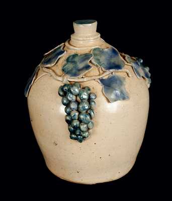 Outstanding Large Stoneware Bank with Applied Grapes and Grape Leaves