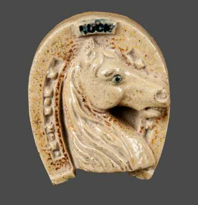 Unusual Stoneware Figural Horse Head inside Horseshoe Charm, Midwestern origin