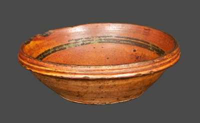 Rare Small Redware Bowl with Slip-Decorated Floral Design, probably Hagerstown, MD area, early 19th century