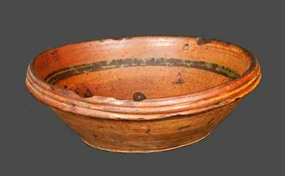 Rare Small Redware Bowl with Slip-Decorated Floral Design, probably Hagerstown, MD area, early 19th century