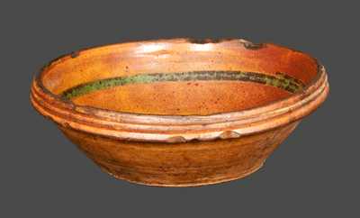 Rare Small Redware Bowl with Slip-Decorated Floral Design, probably Hagerstown, MD area, early 19th century