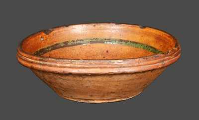 Rare Small Redware Bowl with Slip-Decorated Floral Design, probably Hagerstown, MD area, early 19th century