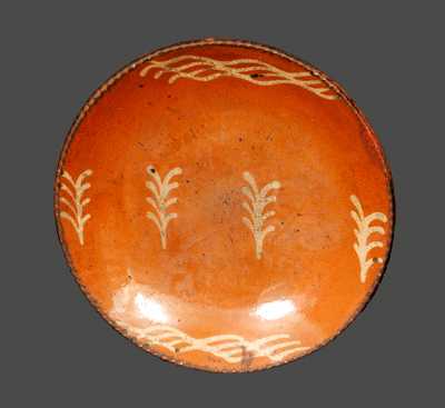 Redware Plate with Yellow Slip Decoration and Coggled Edge
