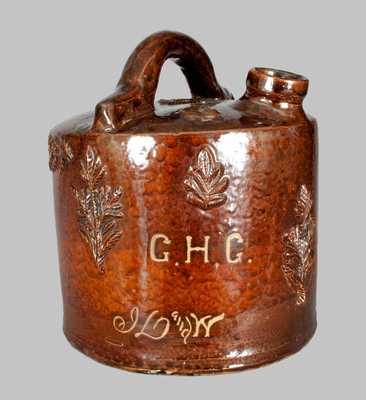 Rare Stoneware Harvest Jug with Raised Designs and 1900 Date, Midwestern origin.