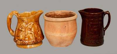 Lot of Three: Rockingham Glazed Pitcher, Redware Jar and Albany Slip Stoneware Pitcher with Swastika