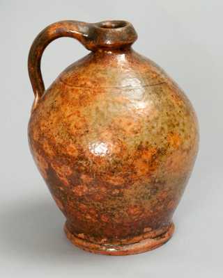 Glazed Redware Jug, New England origin, early 19th century.