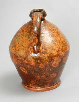 Glazed Redware Jug, New England origin, early 19th century.