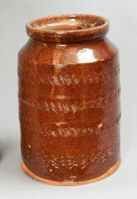 Rare and Fine Glazed Redware Jar with Combed Incising, probably Salem, Massachusetts, late 18th century.