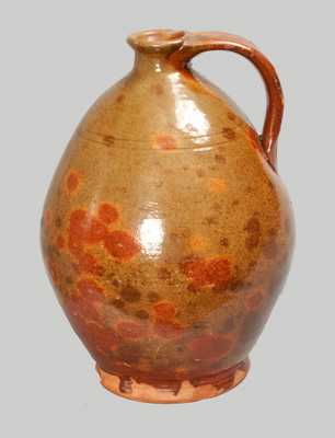 Glazed Redware Jug, probably Massachusetts origin, early 19th century.