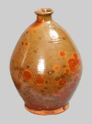 Glazed Redware Jug, probably Massachusetts origin, early 19th century.