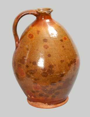 Glazed Redware Jug, probably Massachusetts origin, early 19th century.