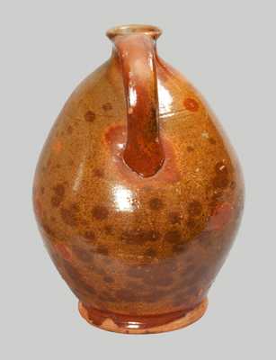 Glazed Redware Jug, probably Massachusetts origin, early 19th century.