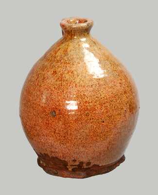 Exceptional Glazed Redware Jug, New England origin, probably Maine, early 19th century.