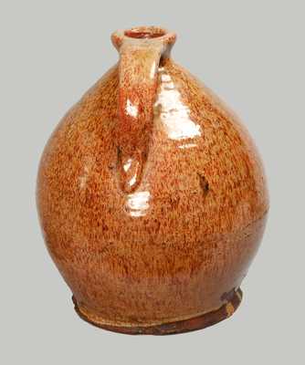 Exceptional Glazed Redware Jug, New England origin, probably Maine, early 19th century.