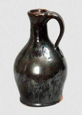 Rare Early Miniature Redware Jug, New England origin, late 18th or early 19th century.