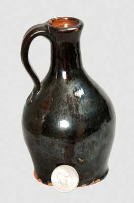 Rare Early Miniature Redware Jug, New England origin, late 18th or early 19th century.